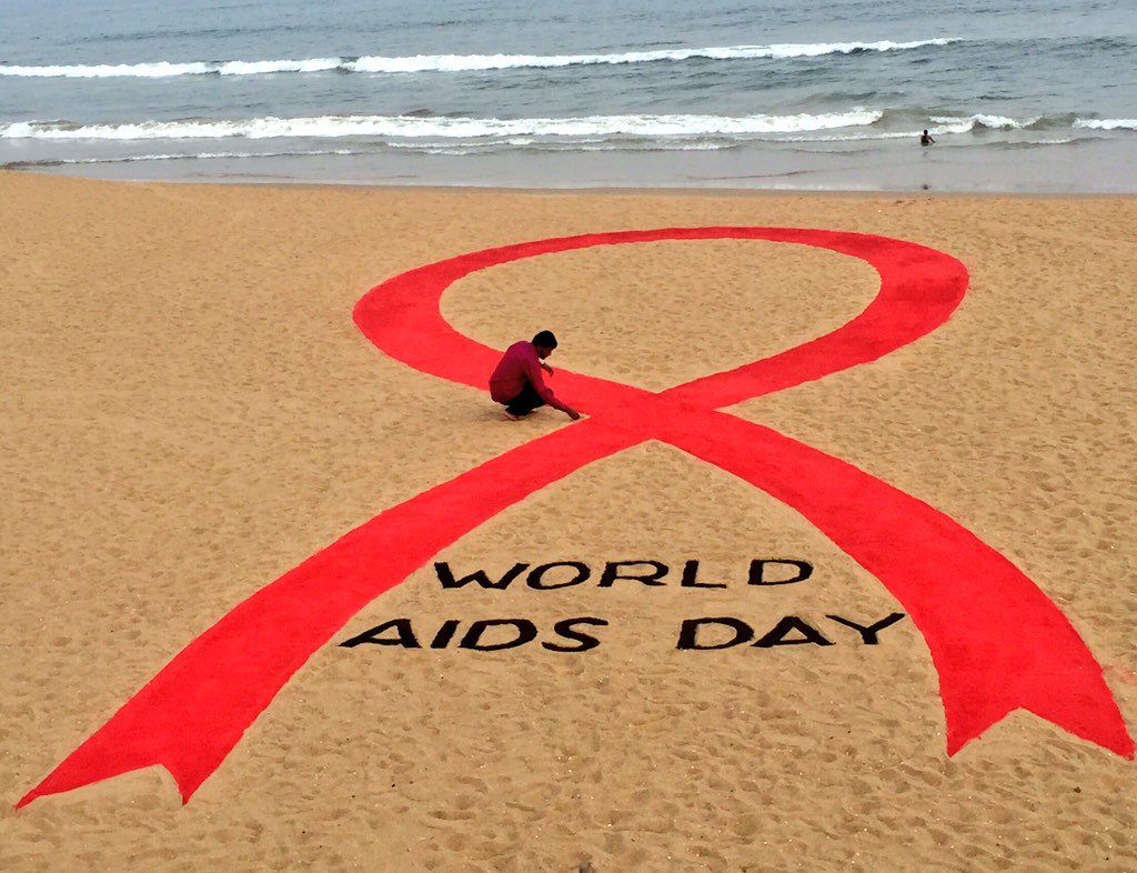 sudarsansand's tweet photo. On #WorldAIDSDay my sand ribbon at Puri beach of Odisha #india https://t.co/mk7wxH8xis