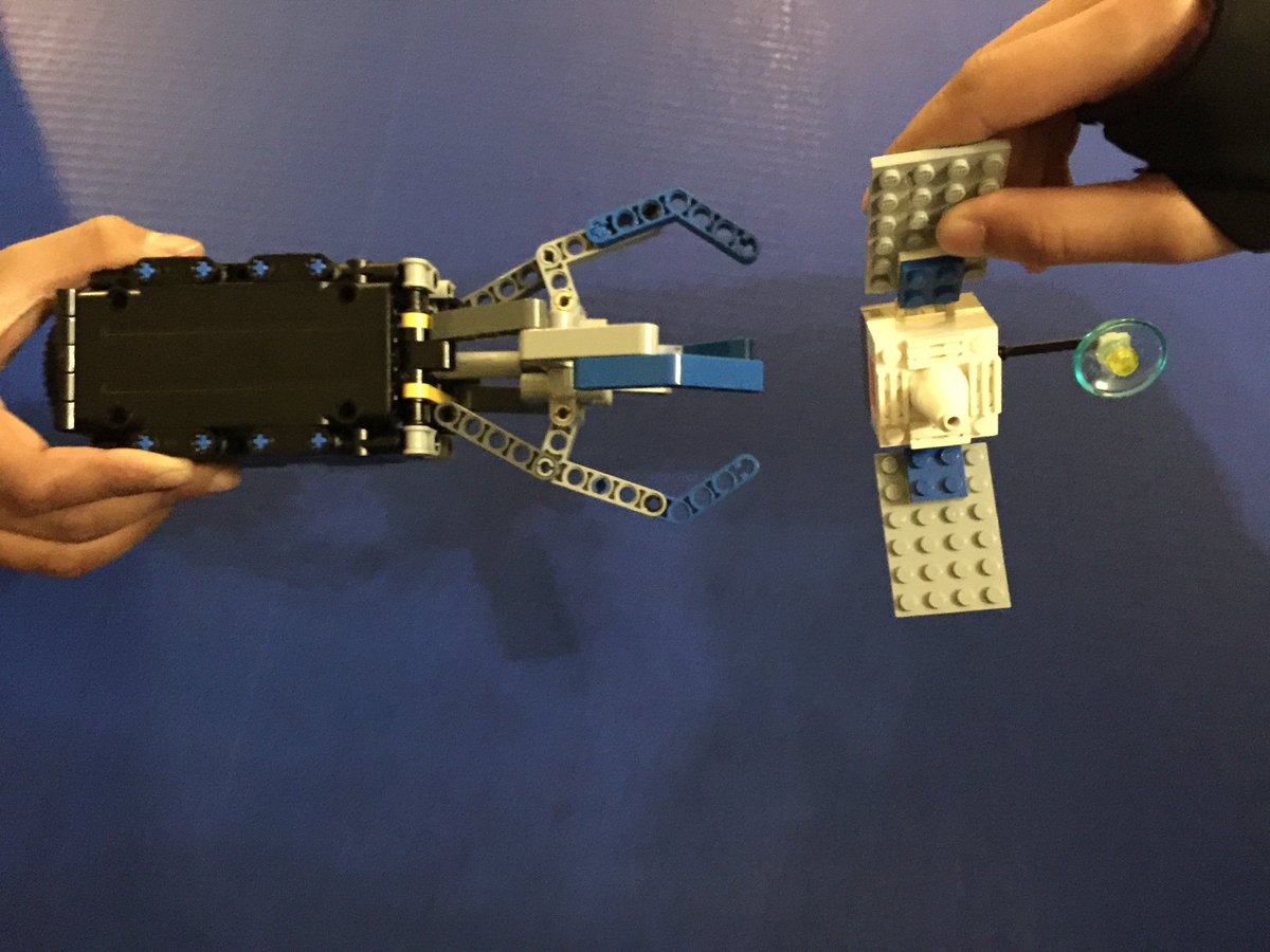 FLLRadicals's tweet image. @FLLRadicals hands on learning for #TrashTrek #spacedebris project: CleanSpaceOne Janitor satellite built with Lego