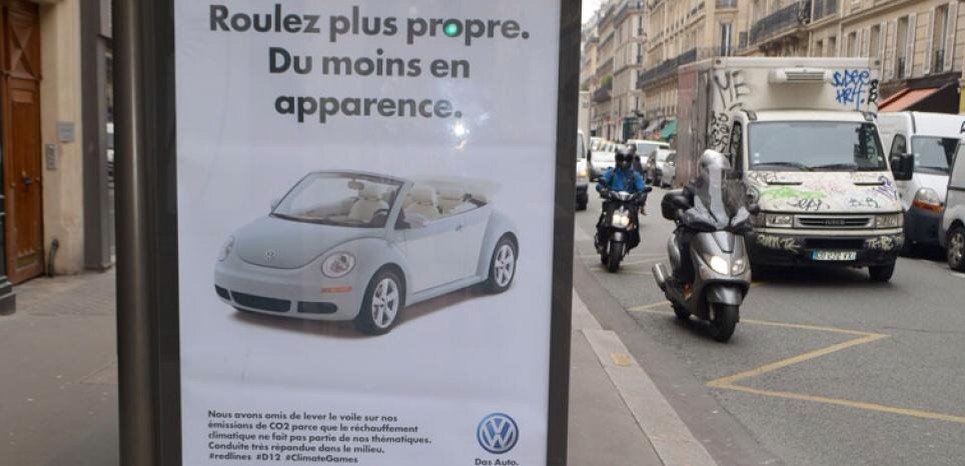 Socialter's tweet photo. #brandalism:600 panneaux dans #Paris pour détourner des slogans publicitaires de sponsors #COP21.Audace ou déjà-vu ? https://t.co/2IFm945yhw