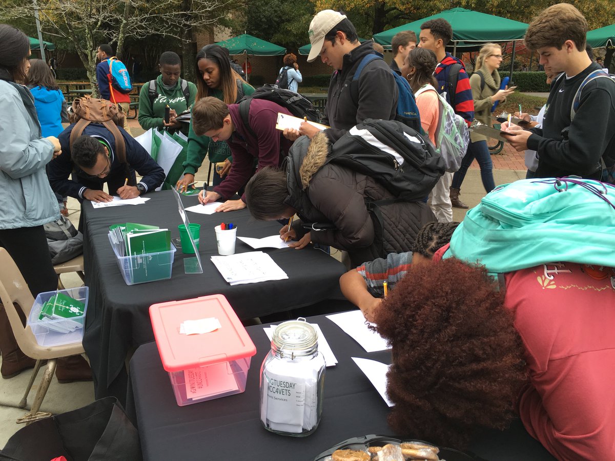 unccharlotte's tweet photo. Thanks to all the Niners who signed holiday cards for our troops today! #UNCC4Vets #UNCC #GivingTuesday https://t.co/qoU0NVe714