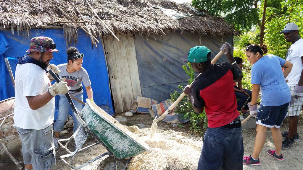 AndrewJJacobson's tweet photo. Paula, Dana and Edwin, mixing sand and gravel to make  cement.  Bob and I mixing cement for the house foundation. https://t.co/XWzrB7S6Jl