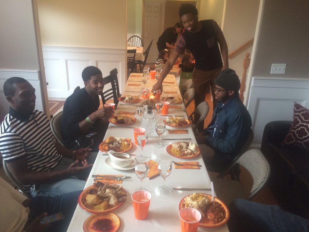 NOT_AICMBB's tweet photo. Men's basketball spent Thanksgiving together at head coach Andy Burkholder's house.  #family https://t.co/D40LjGBrbA
