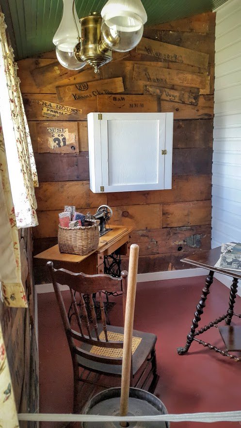 Back wall made out of old shipping crates. Looks straight off Pinterest. #wy125 #sweetwaterwy #jcpenney #shabbychic