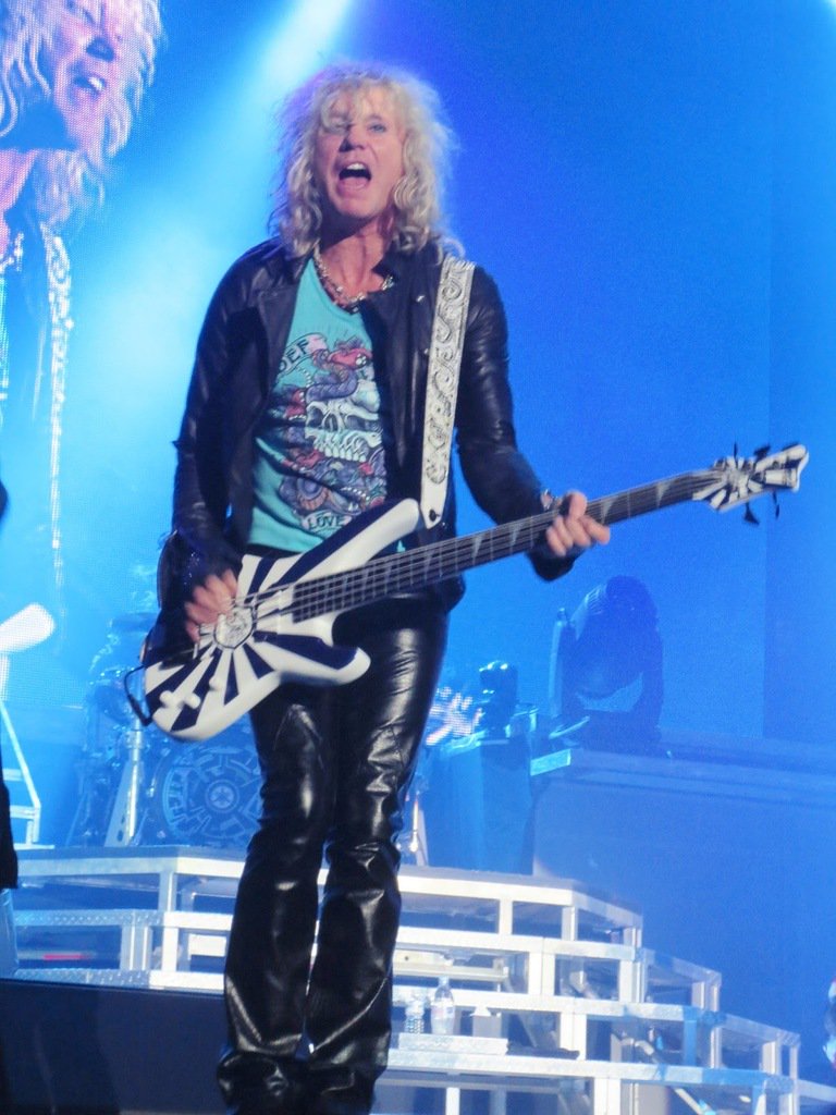 Happy 55th Birthday to Rick Savage of - & owner of a rather spendid bass guitar. 