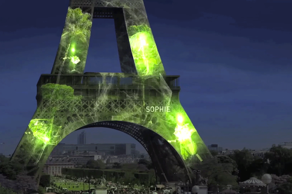 onEarthMag's tweet photo. The Eiffel Tower has transformed into a virtual forest for #COP21. https://t.co/DXbSbKHQW0 https://t.co/8N3hkXqqgD