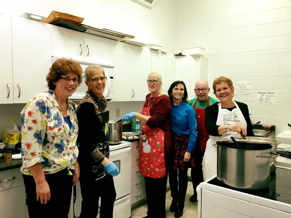 The Department of Development and Alumni Engagement hard at work making Potato Corn Chowder and Beef Chilli soups!