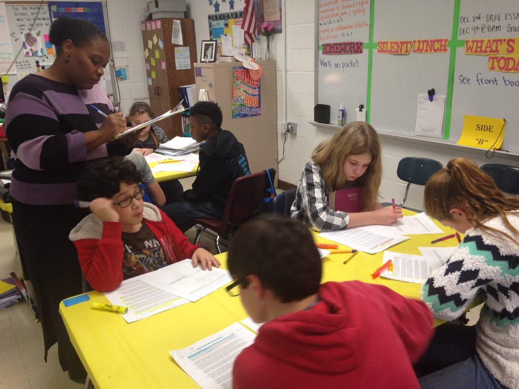 LindseyJ_HMS's tweet photo. Ms Sawe is working the room while kids are working the text @OBMSPride @jessmellsmom @GenerationReady #dcs2core https://t.co/JylY303fLl