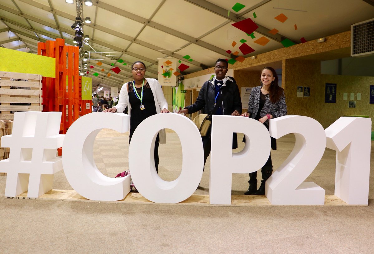 GK Leaders Brianna, Victoria &amp; Digna at #COP21 holding leaders accountable for halting the rate of #climate change!