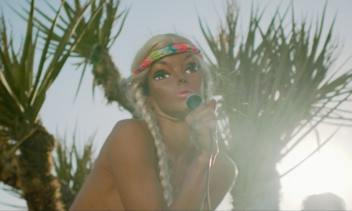 pitchfork's tweet photo. .@peaches' crazy "Rub" video features full-frontal nudity, sex acts, and public urination https://t.co/BB1utyCBOp https://t.co/CQHQUoH0Np