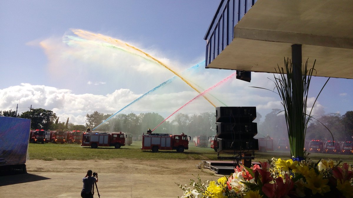 rbmarcial's tweet photo. 'Rainbow shower'. Newly acquired BFP fire trucks demonstrating its water discharge during the turnover ceremony . https://t.co/oAfd7sKQ4c