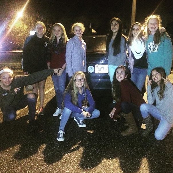 ncpowervb's tweet photo. your fabulous 13-1s and they're amazing assistant coach posing in front of coach Jefs car! YAY =D https://t.co/ZQWGlEoqla