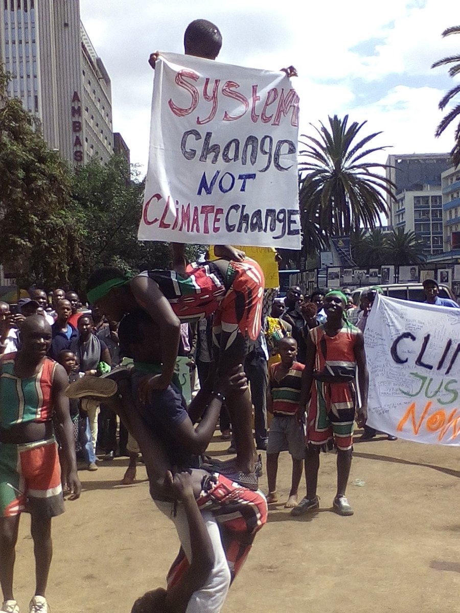 cidioti's tweet photo. System Change not Climate Change #ClimateMarchKE Nairobi Kenya #COP21 #iotke @FlozyA @pacja1 @UKatiba @iKombati https://t.co/9L4y2vbGFw