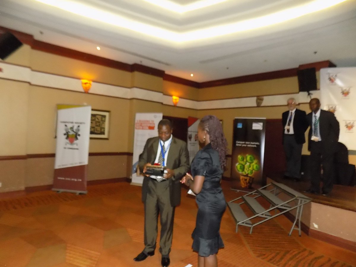 compsocietyzim's tweet photo. #CSZSS15 @SupaCollinsM @ZBCNewsonline CSZ Director Appreciating Hon. D. Minister for officiating Summer School 2015 https://t.co/TYdwPkrETW