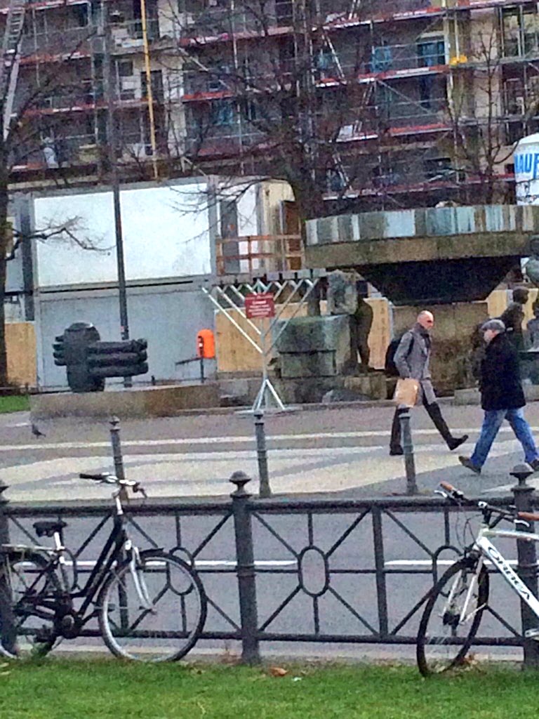 LahavHarkov's tweet photo. This @Chabad menorah is across the street from this sign (abt trains 2 concentration camps) in Berlin #AmYisraelChai https://t.co/UaAhEVlDf1