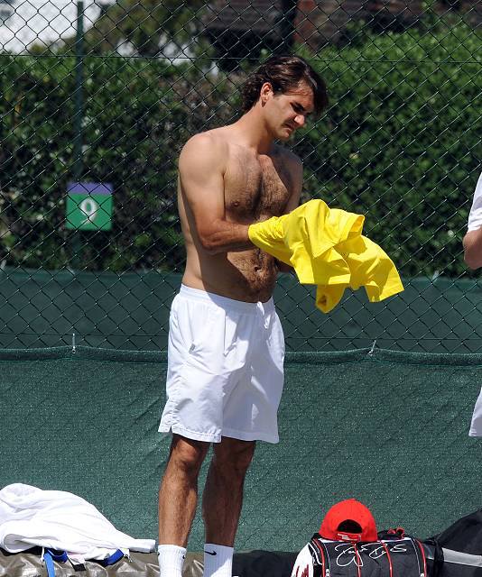 dm_mauron's tweet photo. Roger removes the t-shirt #YellowRF https://t.co/suC5D433OD