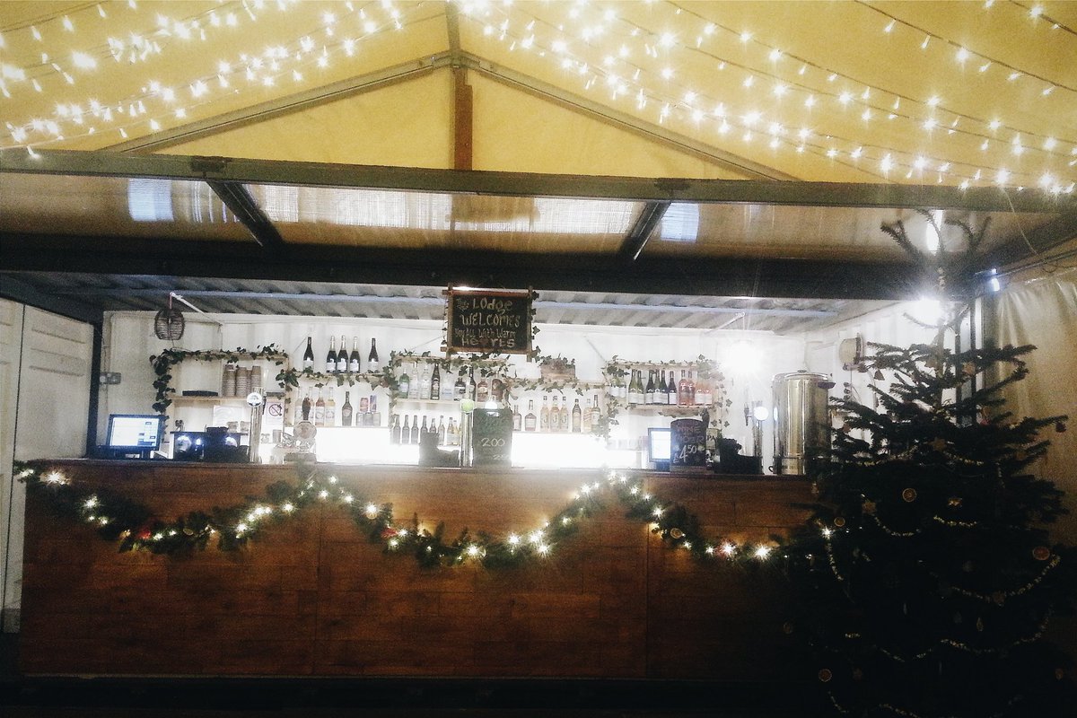 TheShackMCUK's tweet photo. Nothing but warm winter vibes here at the Lodge. Log fire, mulled wine &amp; cider, German-style food and drinks. Yum! https://t.co/yc4SKs03JP