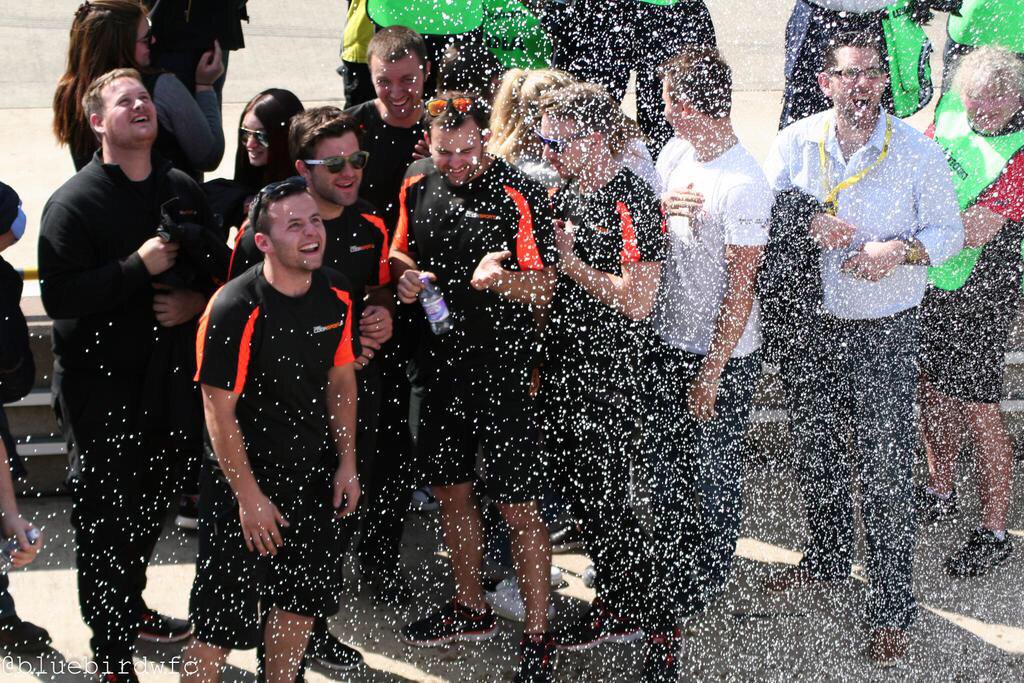 cooksport's tweet photo. This is what it's all about! The maiden Podium in @DunlopBTCC. Showering the @TeamCooksport crew! #legends https://t.co/OqvW2kodeK