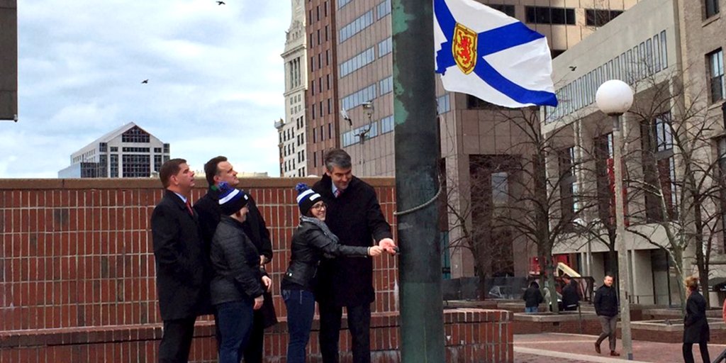 CityOfBoston's tweet photo. Raising the @nsgov flag on Boston #CityHallPlaza. Special thanks for the @TreeforBoston #HappyHolidays #NovaScotia https://t.co/3Q5YNExIJL