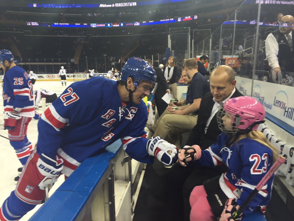 NYRangers's tweet photo. Kayleigh meets some of her #NYR teammates on the team bench. #GDFWEEK @gardenofdreams https://t.co/ZCBAYnhott