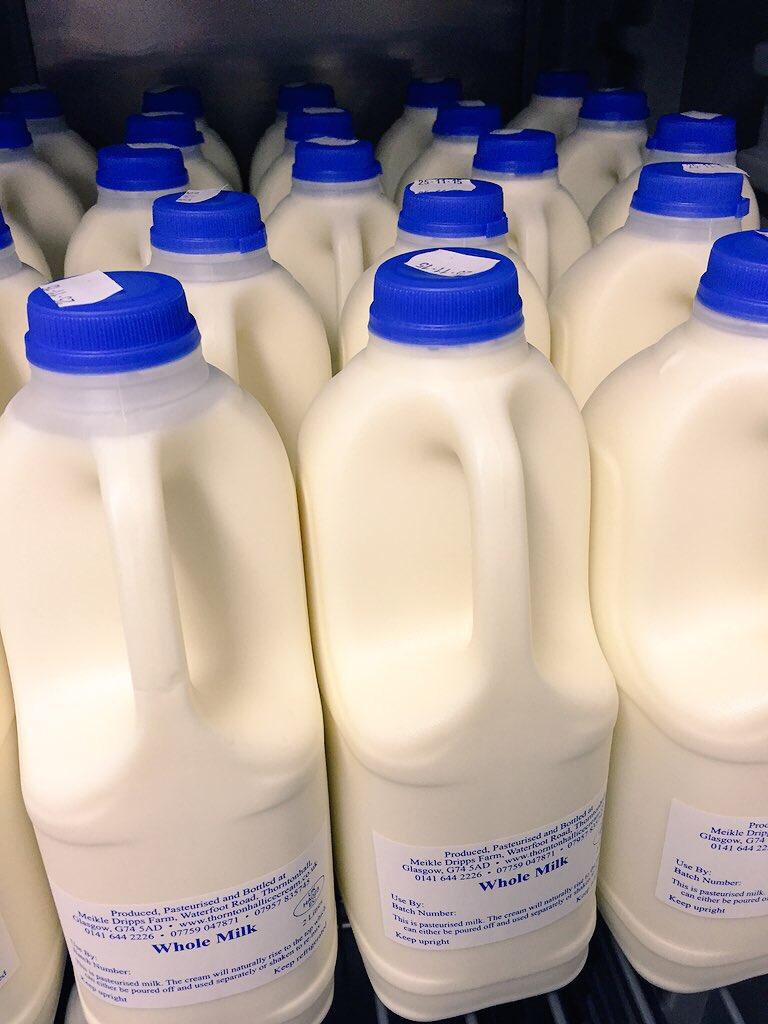 Milk is ready. Collection at the farm.  Yum.