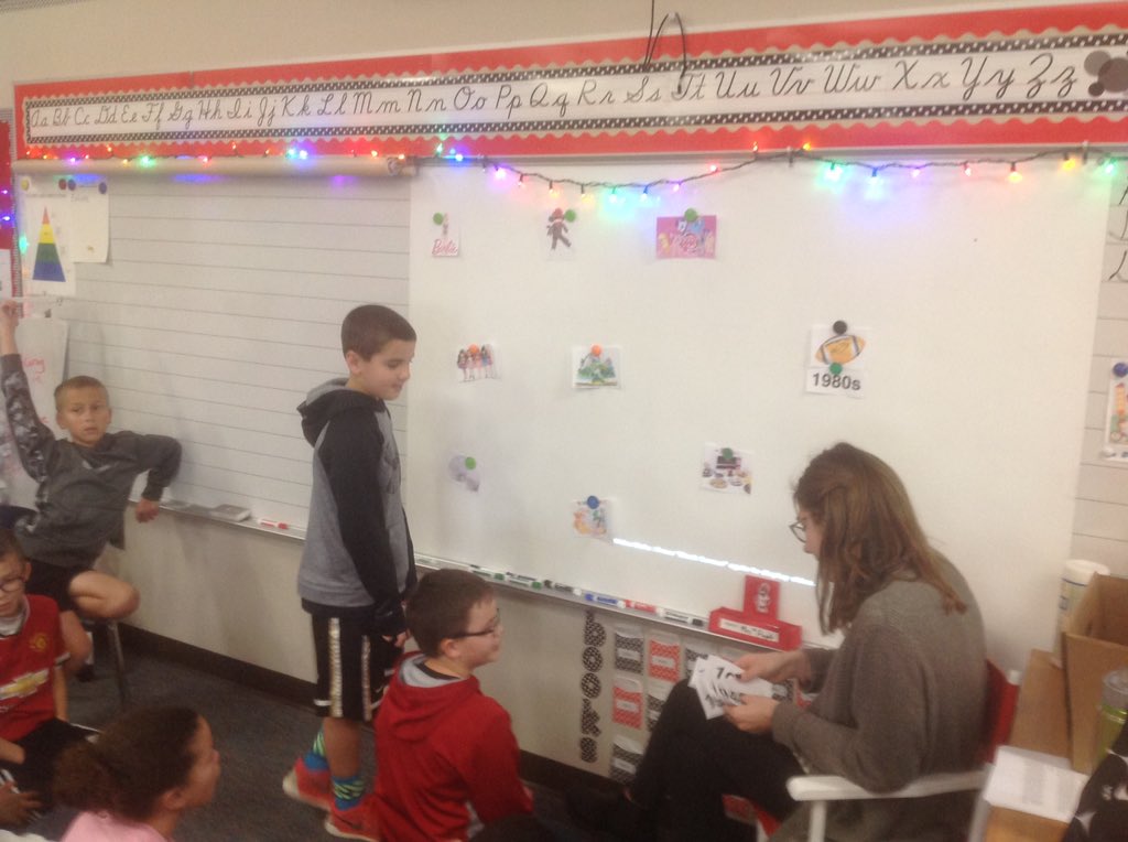 MrsPugel's tweet photo. Miss Lizzie introducing our new PBL on toys! #TCEcardinals #DecemberLearning https://t.co/sHaSOJZJFP