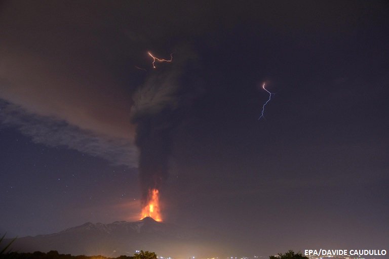 bbcweather's tweet photo. #Lightning flashes as #MountEtna erupts in Sicily yesterday. More global pics: https://t.co/XLGN8zhhDp Dija https://t.co/qo4EV2YVFq