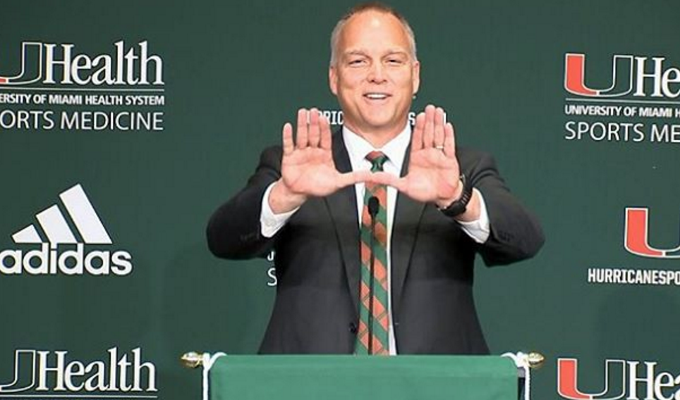 BR_CFB's tweet photo. New Miami Hurricanes coach Mark Richt throws up the “U” during introductory presser https://t.co/wq9CXGD4sb https://t.co/830k3VONaw