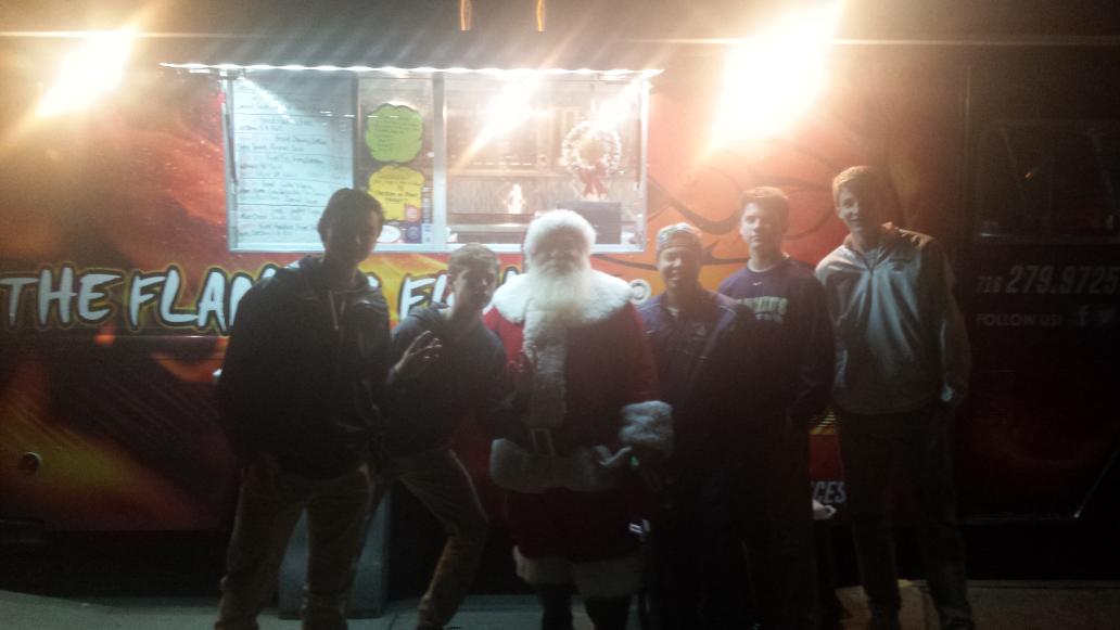 FlaminFishTruck's tweet photo. You never know who you'll run into @ElmwoodVillage  on a Friday night!! 🎅🎄🎅 #HoHoHo #theactions https://t.co/Czs9mlr2YY