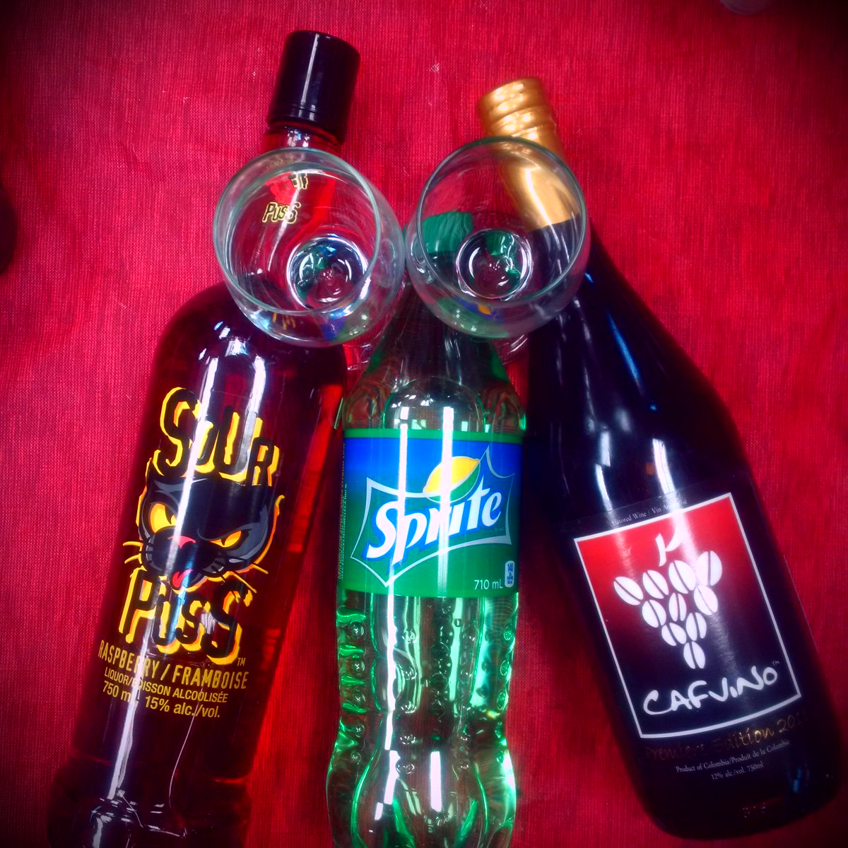 CafVino's tweet photo. The CafVino Kiss:
1 Oz. #CafVino 
1 Oz. Raspberry SourPuss 
3 Oz. Sprite
Get it @littleguyliquor 
#bestgiftever #yeg https://t.co/u0PXr2R19j