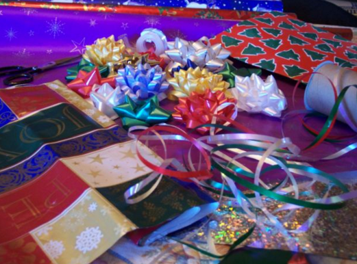 marcoscville's tweet photo. Shiny wrapping paper and ribbons galore! What do you hope to find when it's all on the floor? https://t.co/XSA4yLdswT