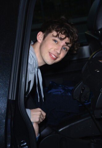 bunnyhopfreak's tweet photo. when the paparazzi are following celebrities, they usually dont look into the camera or react but then theres troye https://t.co/m5N2c44CrI