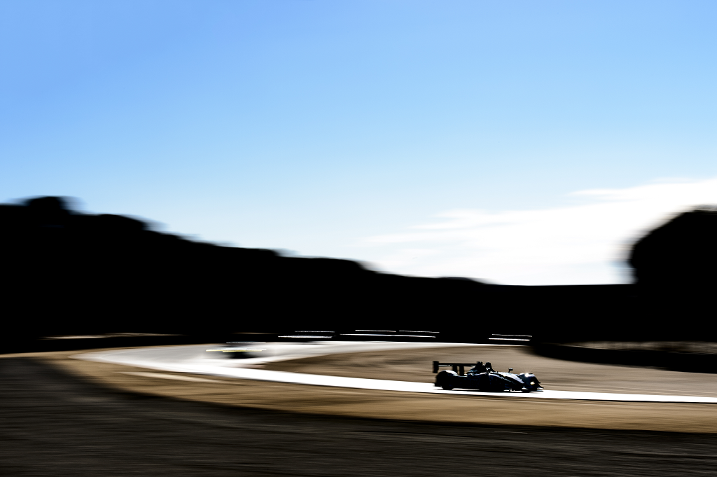 Porsche's tweet photo. "I often like to highlight the pure shapes of race cars and the tracks they race on." Photo By: Camden Thrasher https://t.co/Qd68PFxLZG