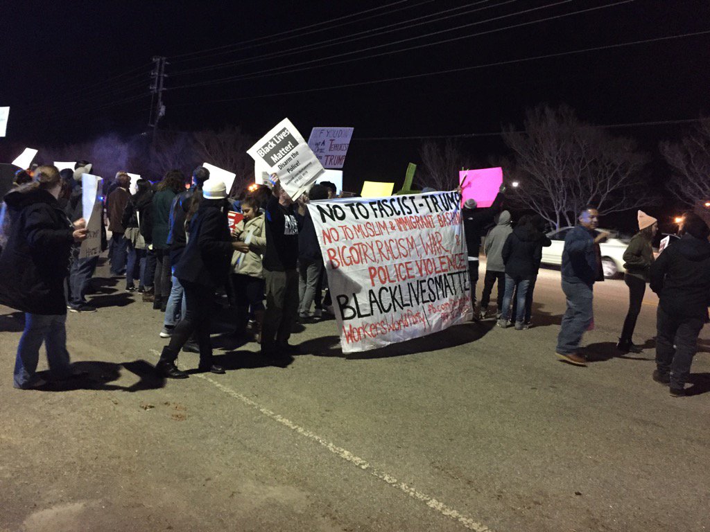 NCCapitol's tweet photo. Protestors outside #Trump rally in Raleigh.  #wral #ncpol https://t.co/6HIy2CR3Qo