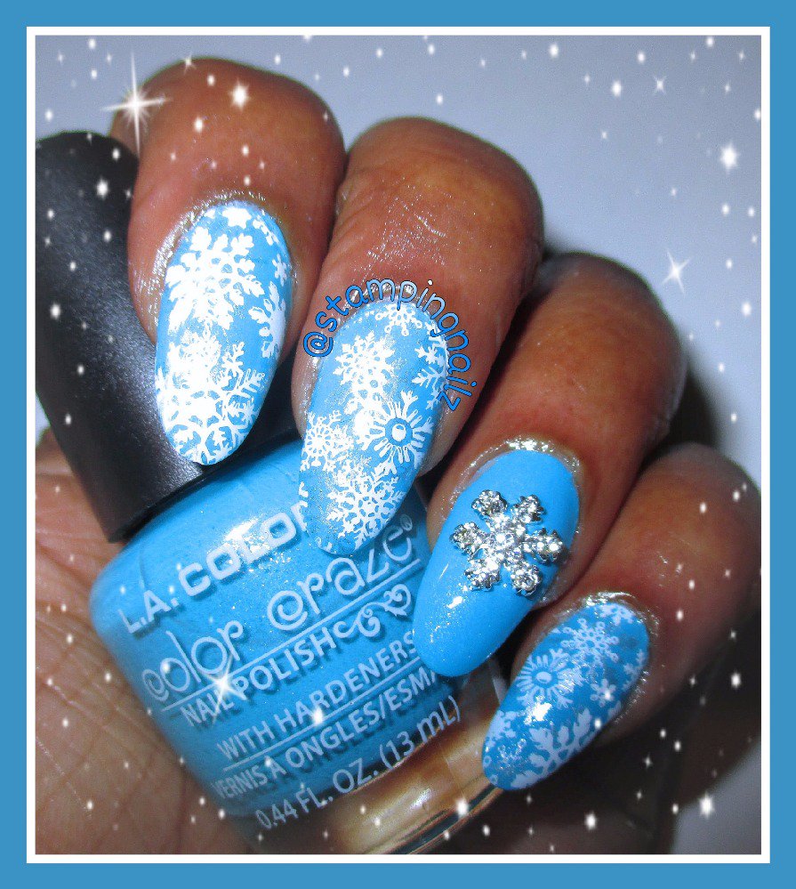 stampingnailz's tweet photo. Here is my Snowflakes Mani using @LAColorsusa baby blue with double stamping. #wnac2015 #nails #notd #nailstamping https://t.co/LHhLQXkfJa