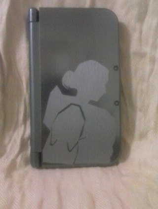 LeoTheT_Rex's tweet photo. @kzuelch It took 2 attempts, but my Agent Tex vinyl sticker is done! Thank you so much for signing my 3DS at #RTX15 https://t.co/ADef9IHpiD
