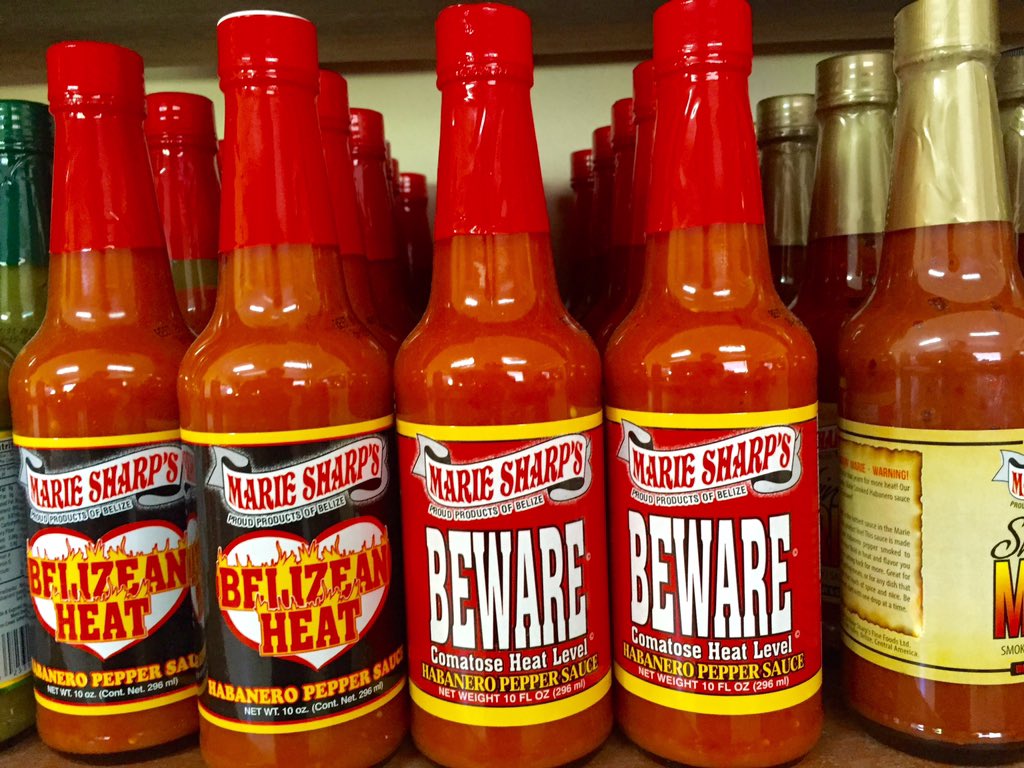phtravel's tweet photo. Iconic foodstuffs in Belize. Marie Sharp's hot sauce and Mayan handmade chocolate. #lpinbelize https://t.co/IQYHUYVL13
