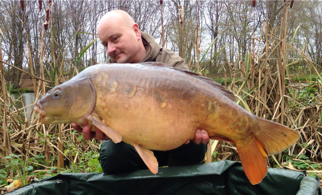 ChurchwoodFish's tweet photo. Owner Steve Sands happy with this 28-08lbs Jenkins Lake mirror this am caught on @CW_Baits Winter White Pop-up https://t.co/RyBkaRbb8a