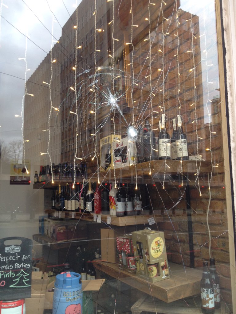 Thanks to the gent who threw a rock at our window last night. Happy Christmas! We're still open and smiling...