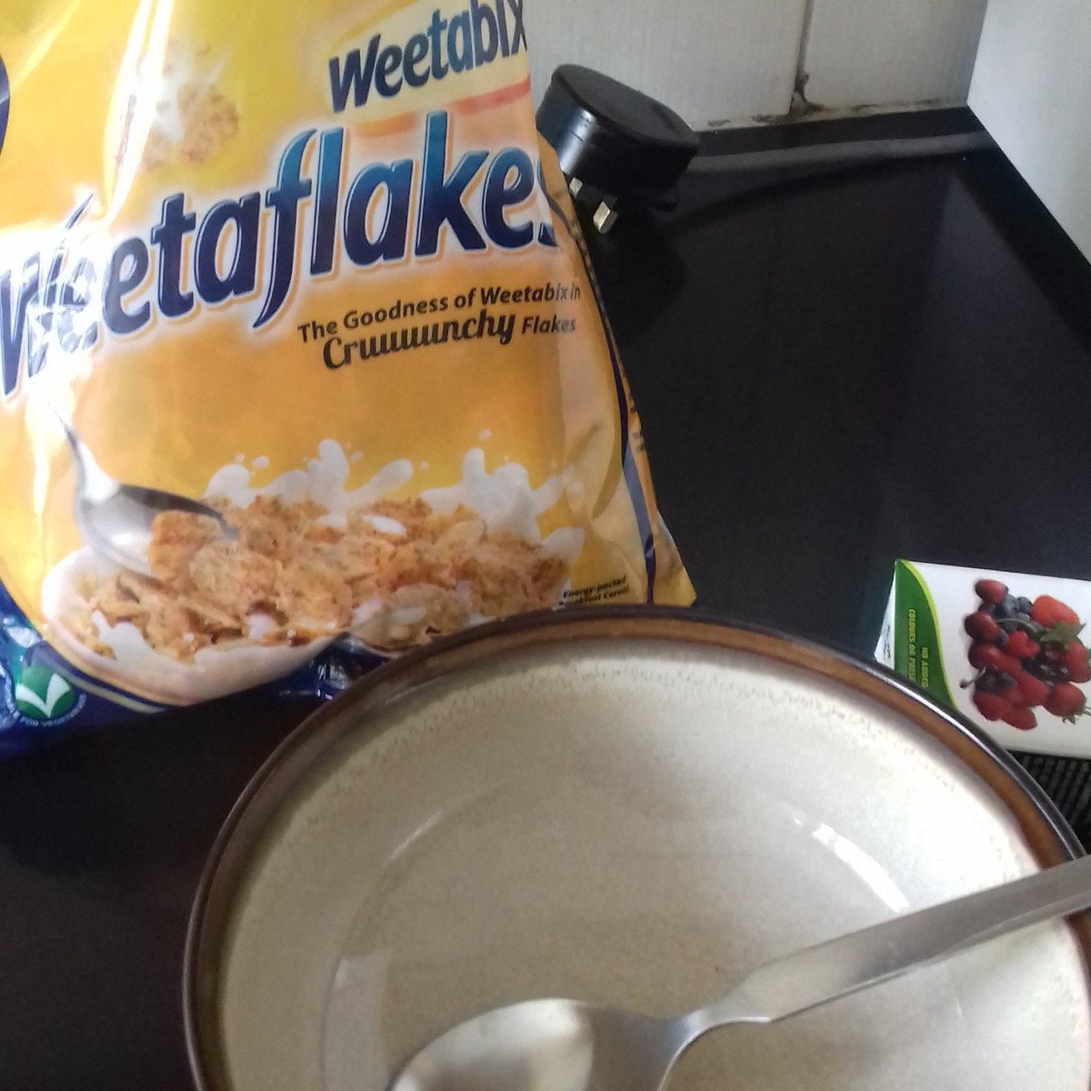 Today's breakfast...homemademandazi and weetaflakes...