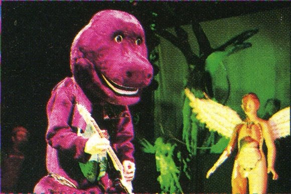 historyofsound's tweet photo. Kurt Cobain dressed as Barney on Halloween of 1993. https://t.co/py6G5qphYV