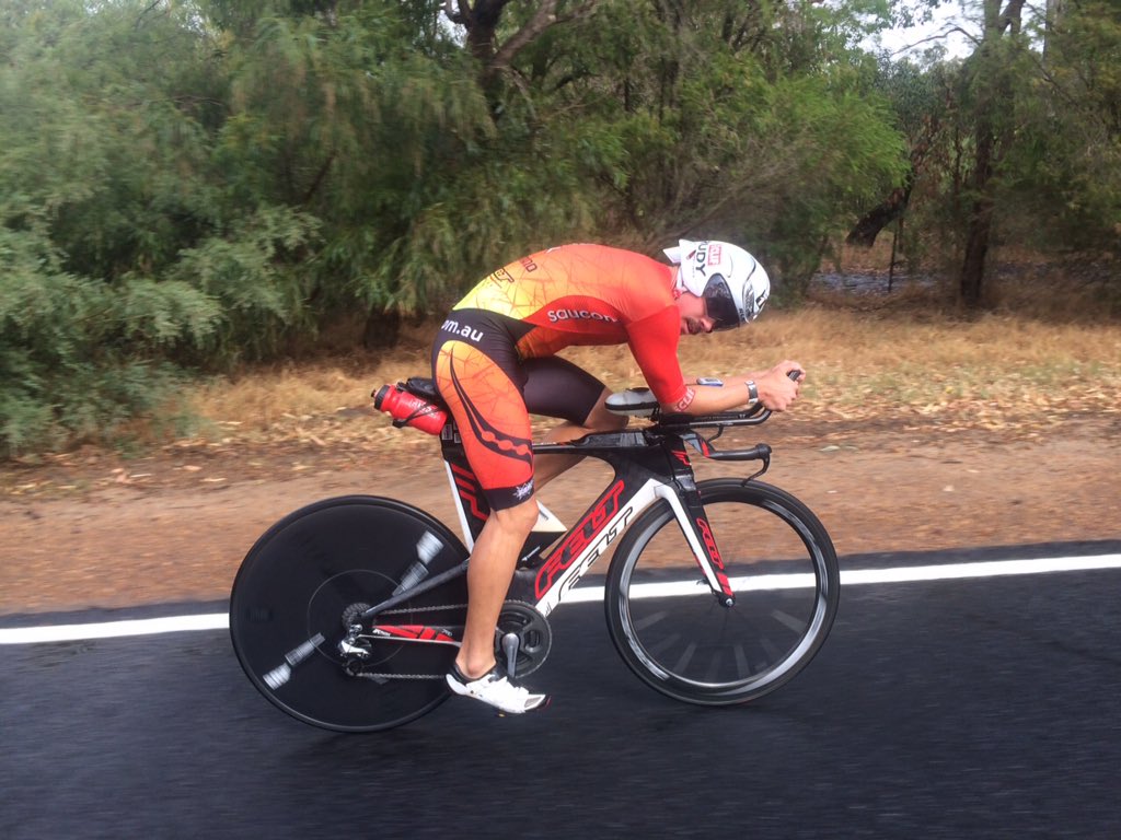 IRONMANOceania's tweet image. #IMWA @Timboreed still rocking the mo, riding solo through 62km mark, 6:00 back from the lead in 6th place.