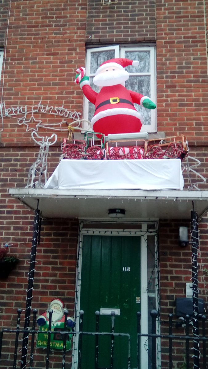 Naseemfk's tweet photo. Watching Santa wobbling  in a high wind to see if he might take off from this house in Clapton. And hoping.. https://t.co/ajm76pMFKd