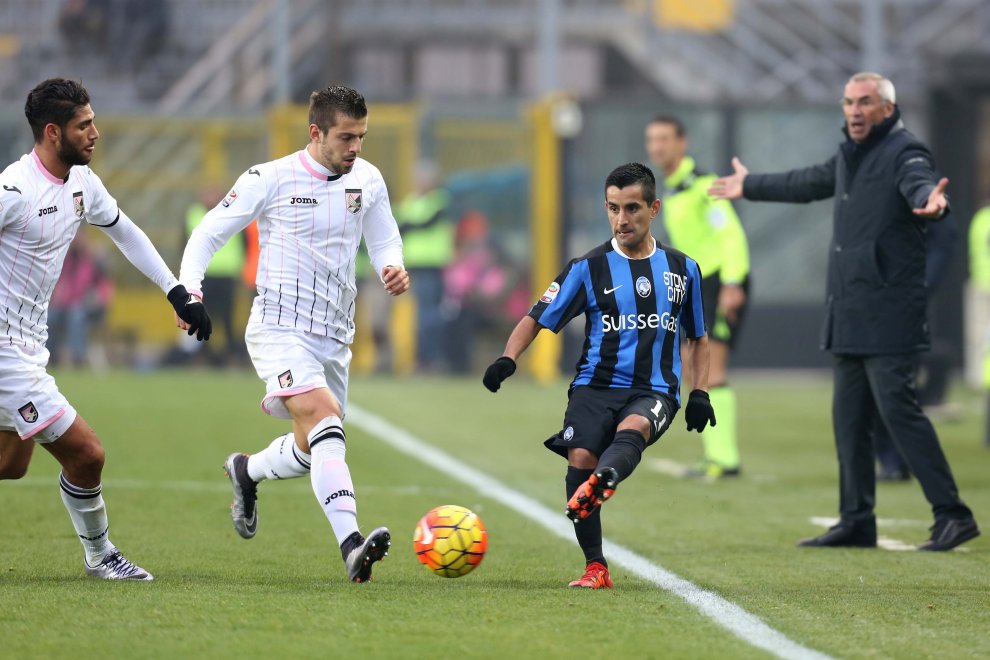 Trajkovski looks to block a pass