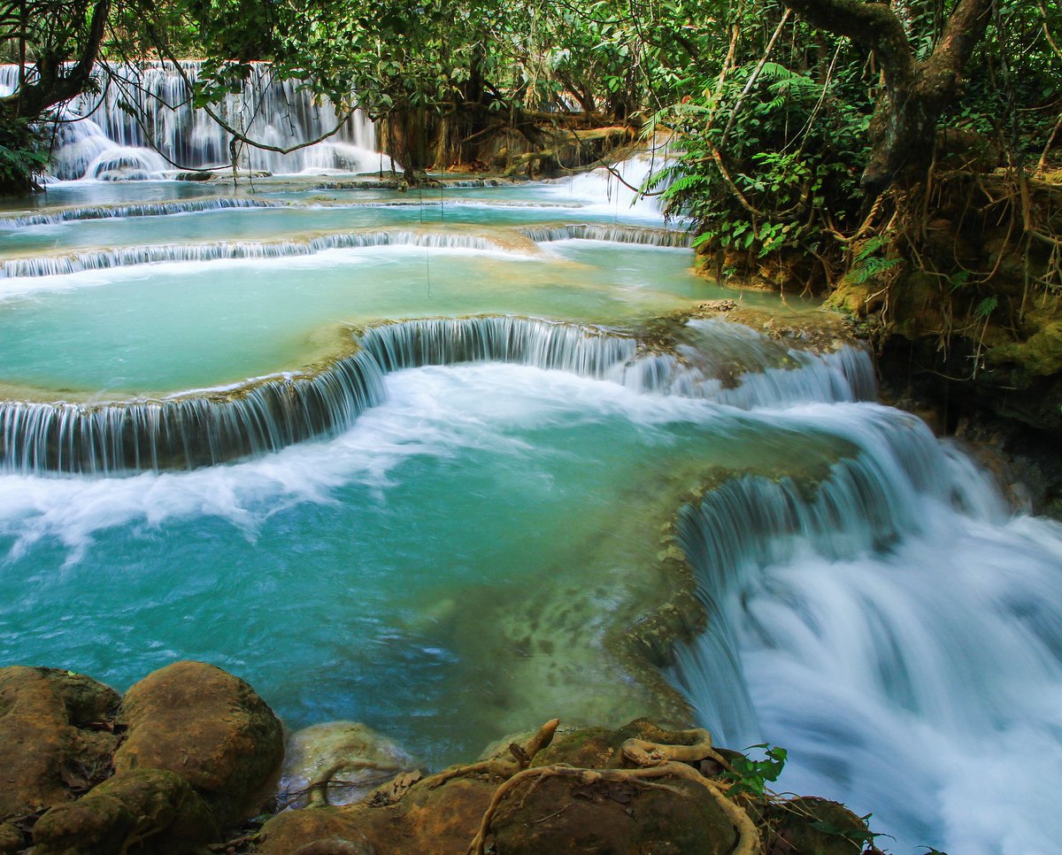 Ever been to #Laos, if not it is time to make the trip! It is home to the stunning and mystical #KuangSiWaterfalls