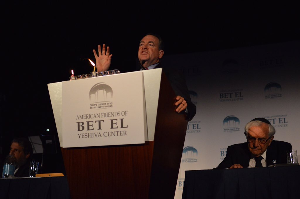 GovMikeHuckabee's tweet photo. A pleasure joining the American Friends of Bet El Yeshiva Center in NYC &amp; the first candle lighting of #Hannukah https://t.co/x09DQC20zu