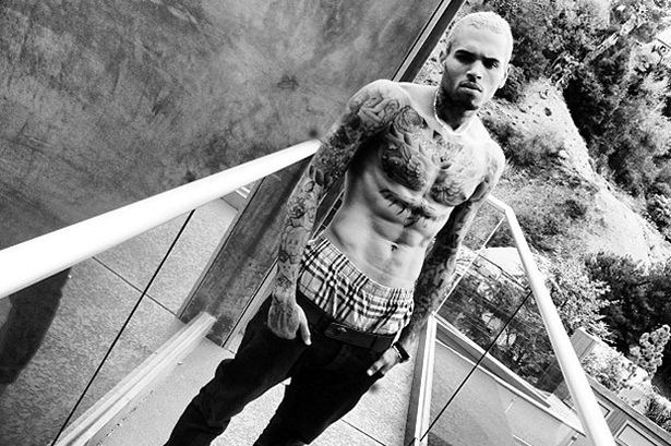 Tattoos, abs, and, bad boy.