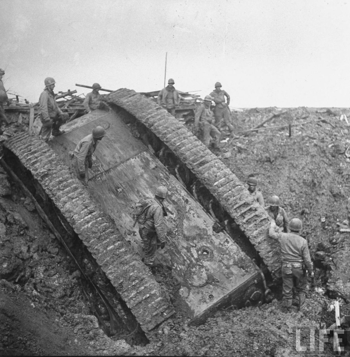 #American GIs inspect an overturned #German tank in December, 1944. (via <a href="/LIFE/">LIFE</a>) #History