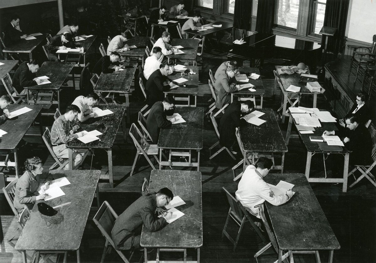 A photograph of students writing exams
