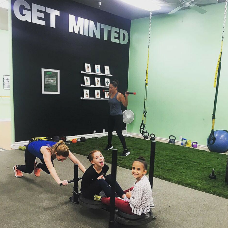 mintbodyaz's tweet photo. I think someone replaced the weights with two adorable girls! Always having fun here at #MintBody! https://t.co/bLvsIorWvi