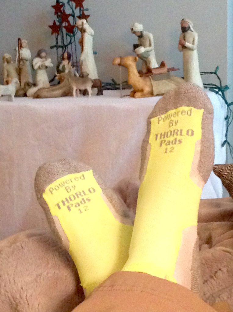 RRSportsChicago's tweet photo. @Thorlo socks: Great for running, but also for lounging w/a Nativity scene in the background. @RRSports #runningsock https://t.co/XJLJZfSp7o